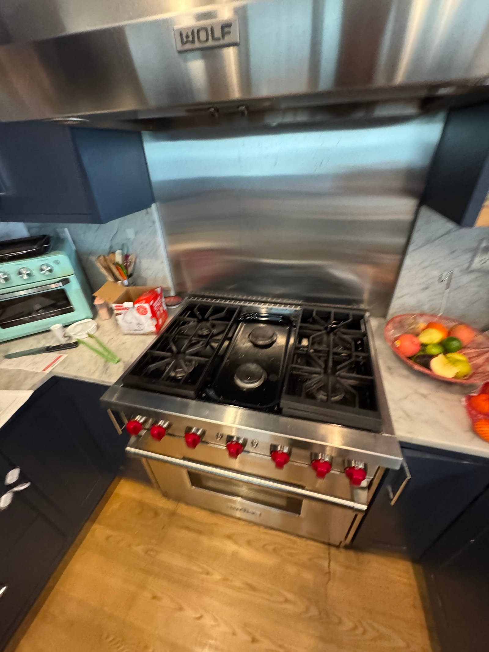 Wolf range in Tribeca loft — service call with blue cabinets